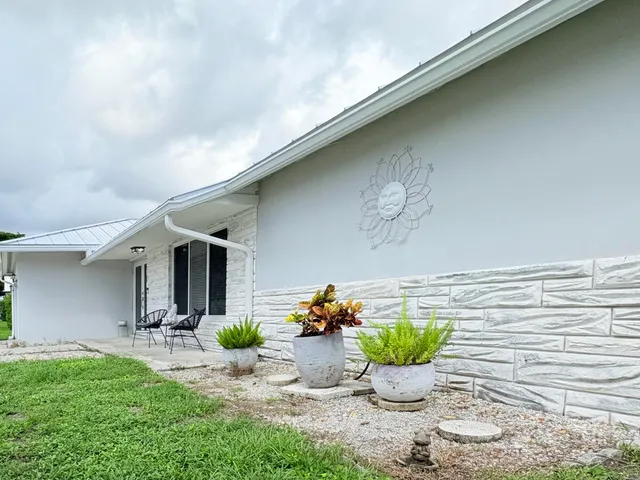 $825,000 | 1861 Caribbean Road West, Lake Clarke Shores, FL 33406