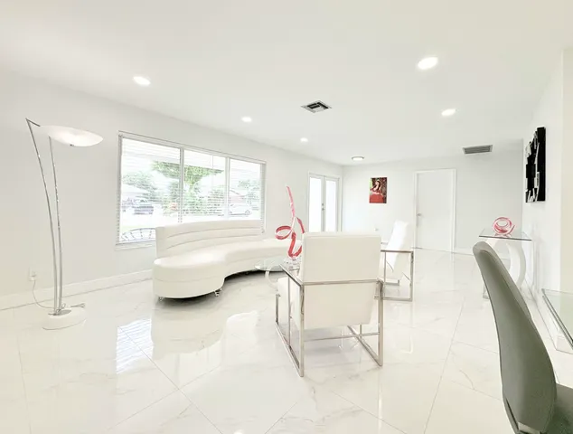 $825,000 | 1861 Caribbean Road West, Lake Clarke Shores, FL 33406