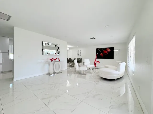 $825,000 | 1861 Caribbean Road West, Lake Clarke Shores, FL 33406