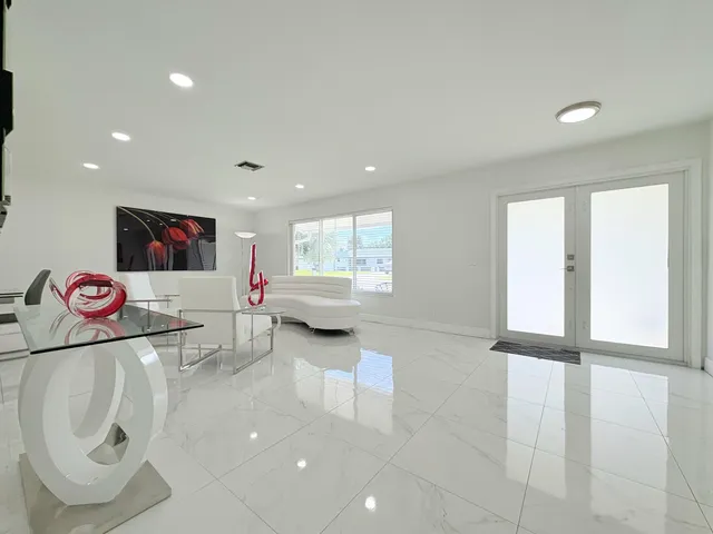 $825,000 | 1861 Caribbean Road West, Lake Clarke Shores, FL 33406