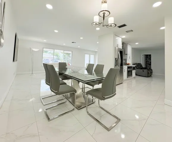 $825,000 | 1861 Caribbean Road West, Lake Clarke Shores, FL 33406