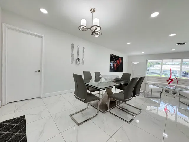 $825,000 | 1861 Caribbean Road West, Lake Clarke Shores, FL 33406