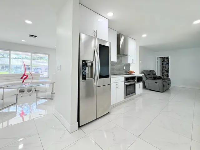 $825,000 | 1861 Caribbean Road West, Lake Clarke Shores, FL 33406