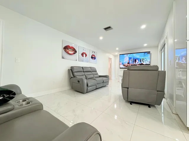 $825,000 | 1861 Caribbean Road West, Lake Clarke Shores, FL 33406