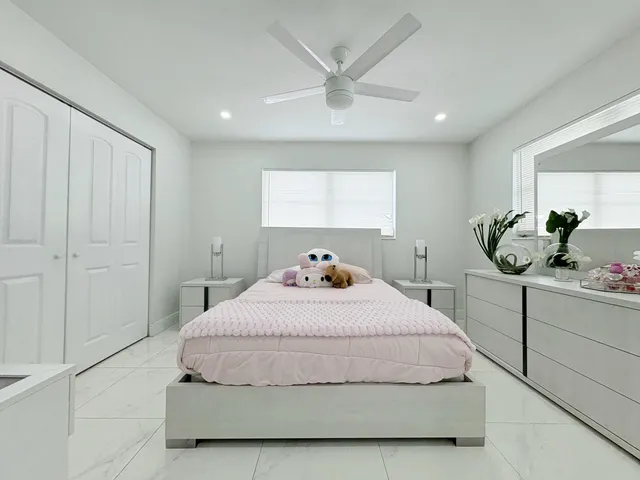 $825,000 | 1861 Caribbean Road West, Lake Clarke Shores, FL 33406