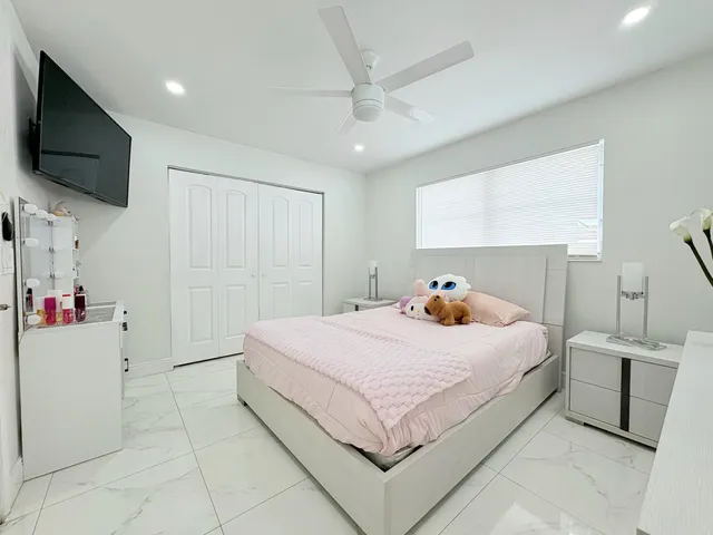 $825,000 | 1861 Caribbean Road West, Lake Clarke Shores, FL 33406