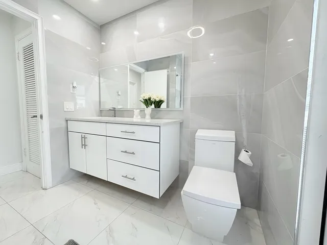 $825,000 | 1861 Caribbean Road West, Lake Clarke Shores, FL 33406