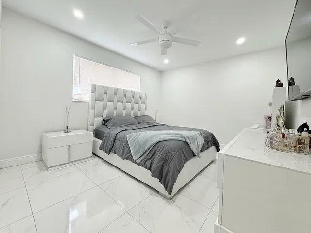 $825,000 | 1861 Caribbean Road West, Lake Clarke Shores, FL 33406