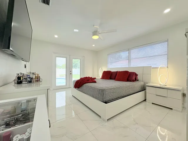 $825,000 | 1861 Caribbean Road West, Lake Clarke Shores, FL 33406