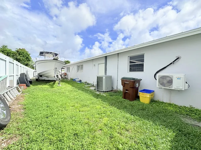 $825,000 | 1861 Caribbean Road West, Lake Clarke Shores, FL 33406