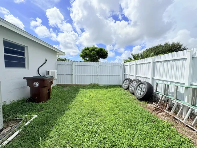 $825,000 | 1861 Caribbean Road West, Lake Clarke Shores, FL 33406