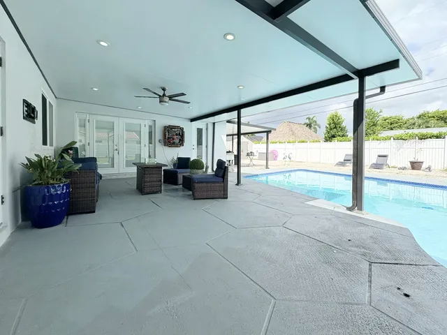 $825,000 | 1861 Caribbean Road West, Lake Clarke Shores, FL 33406