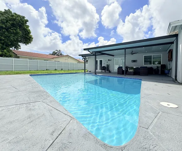 $825,000 | 1861 Caribbean Road West, Lake Clarke Shores, FL 33406