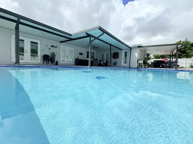 $825,000 | 1861 Caribbean Road West, Lake Clarke Shores, FL 33406