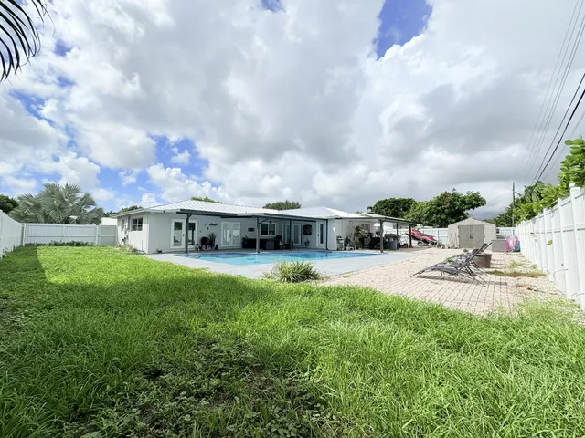 $825,000 | 1861 Caribbean Road West, Lake Clarke Shores, FL 33406