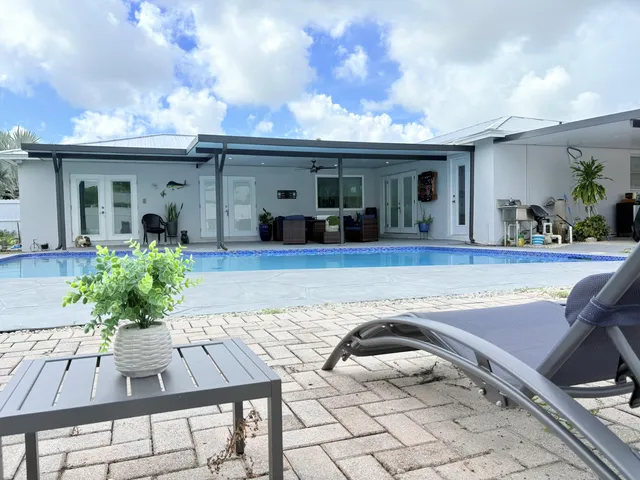 $825,000 | 1861 Caribbean Road West, Lake Clarke Shores, FL 33406