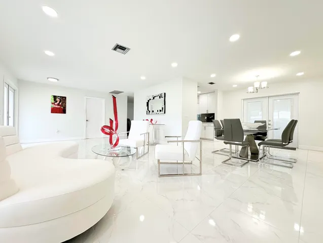 $825,000 | 1861 Caribbean Road West, Lake Clarke Shores, FL 33406