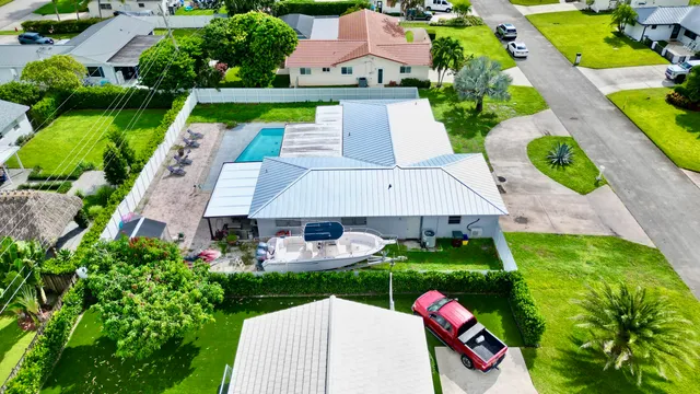 $825,000 | 1861 Caribbean Road West, Lake Clarke Shores, FL 33406