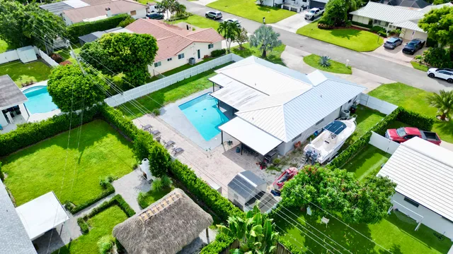 $825,000 | 1861 Caribbean Road West, Lake Clarke Shores, FL 33406