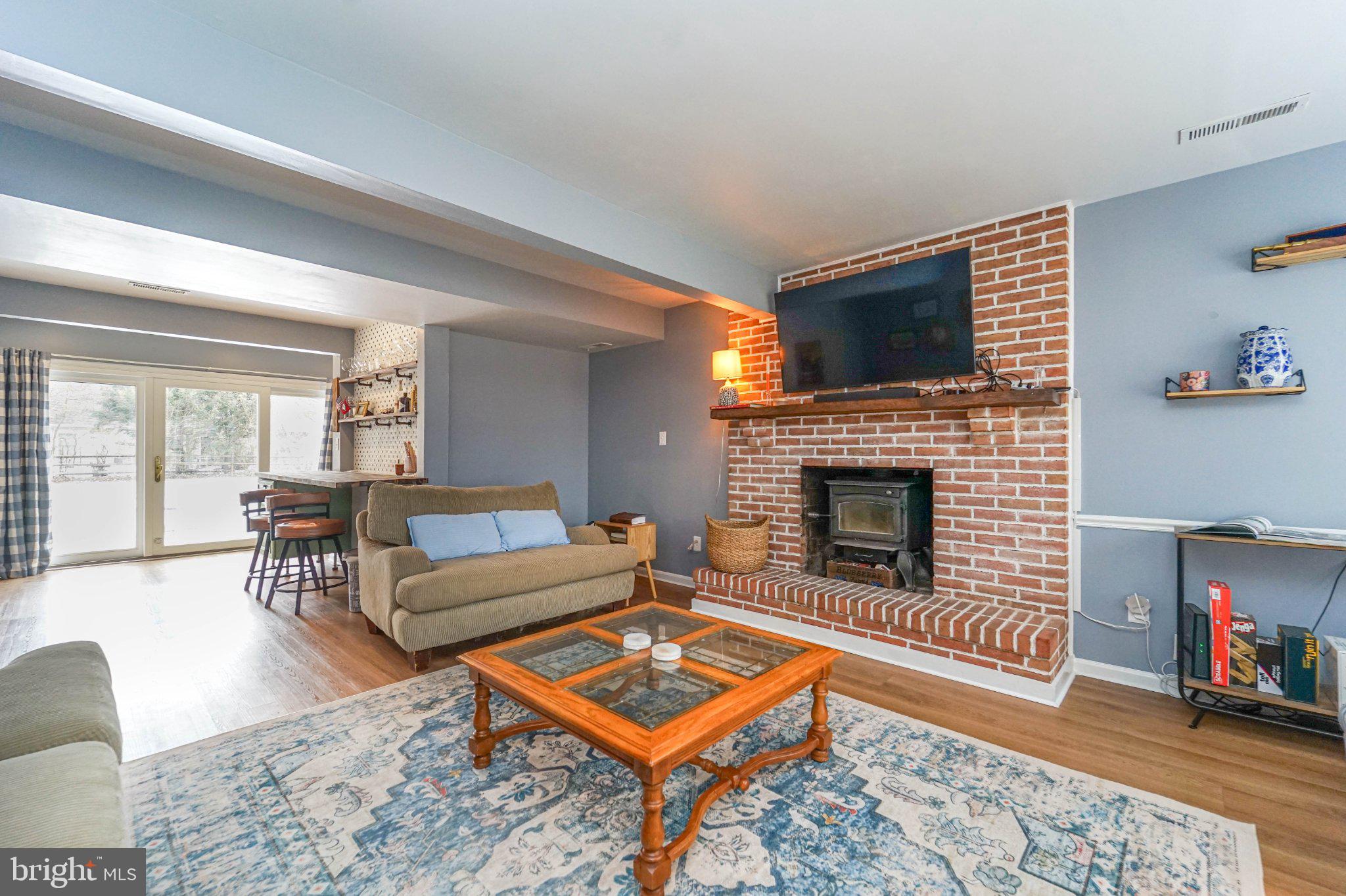 211 Queen Anne Road Stevensville, MD 21666 - Photo 3 of 33 Cozy living space with rustic charm.