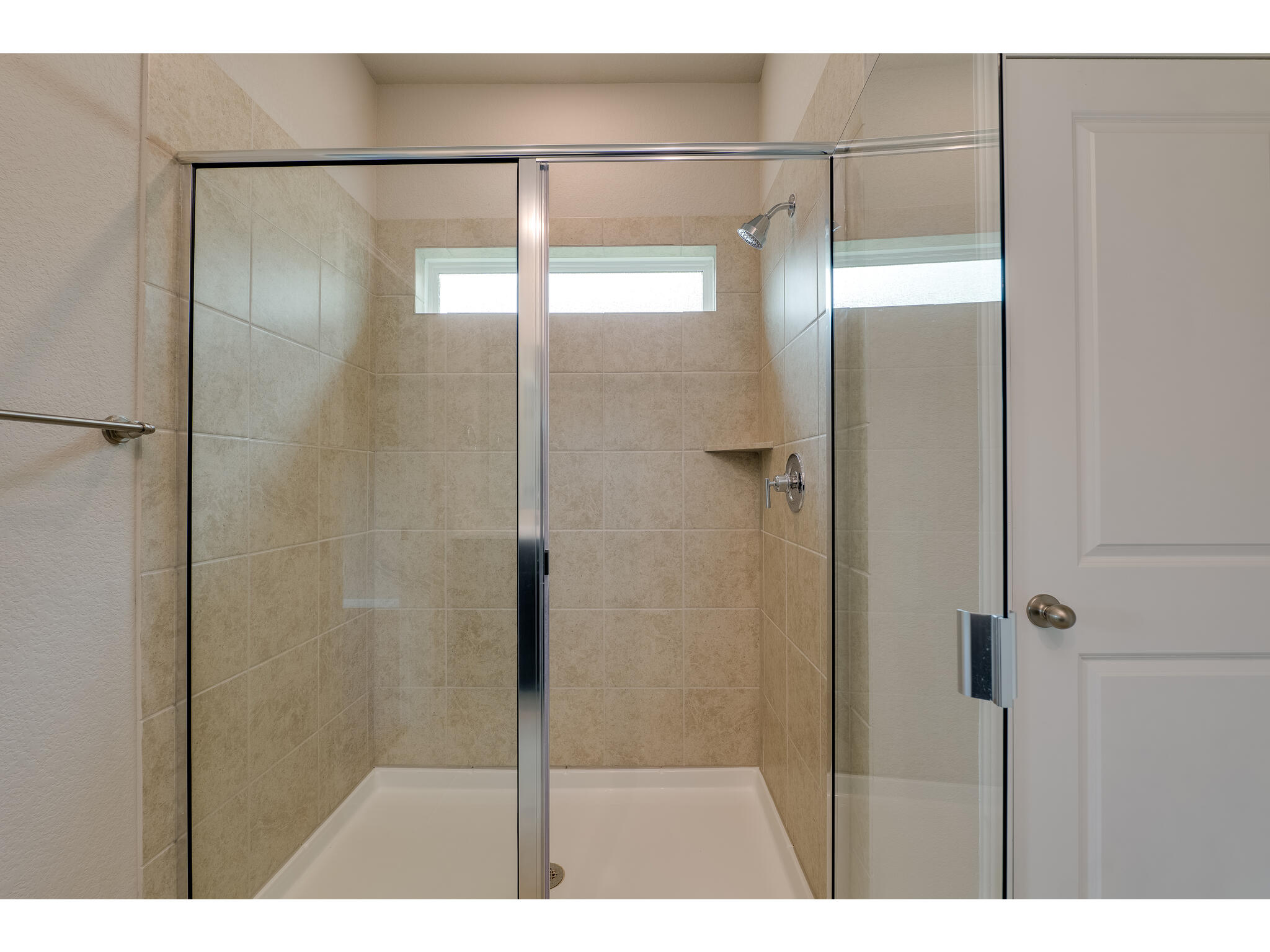 111 Grapefruit Road Hutto, TX 78634 - Photo 21 of 39 Bathroom featuring a stall shower