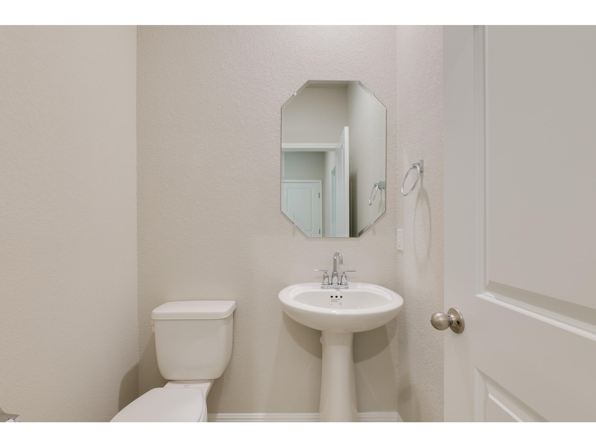 111 Grapefruit Road Hutto, TX 78634 - Photo 26 of 39 Bathroom with toilet and a sink