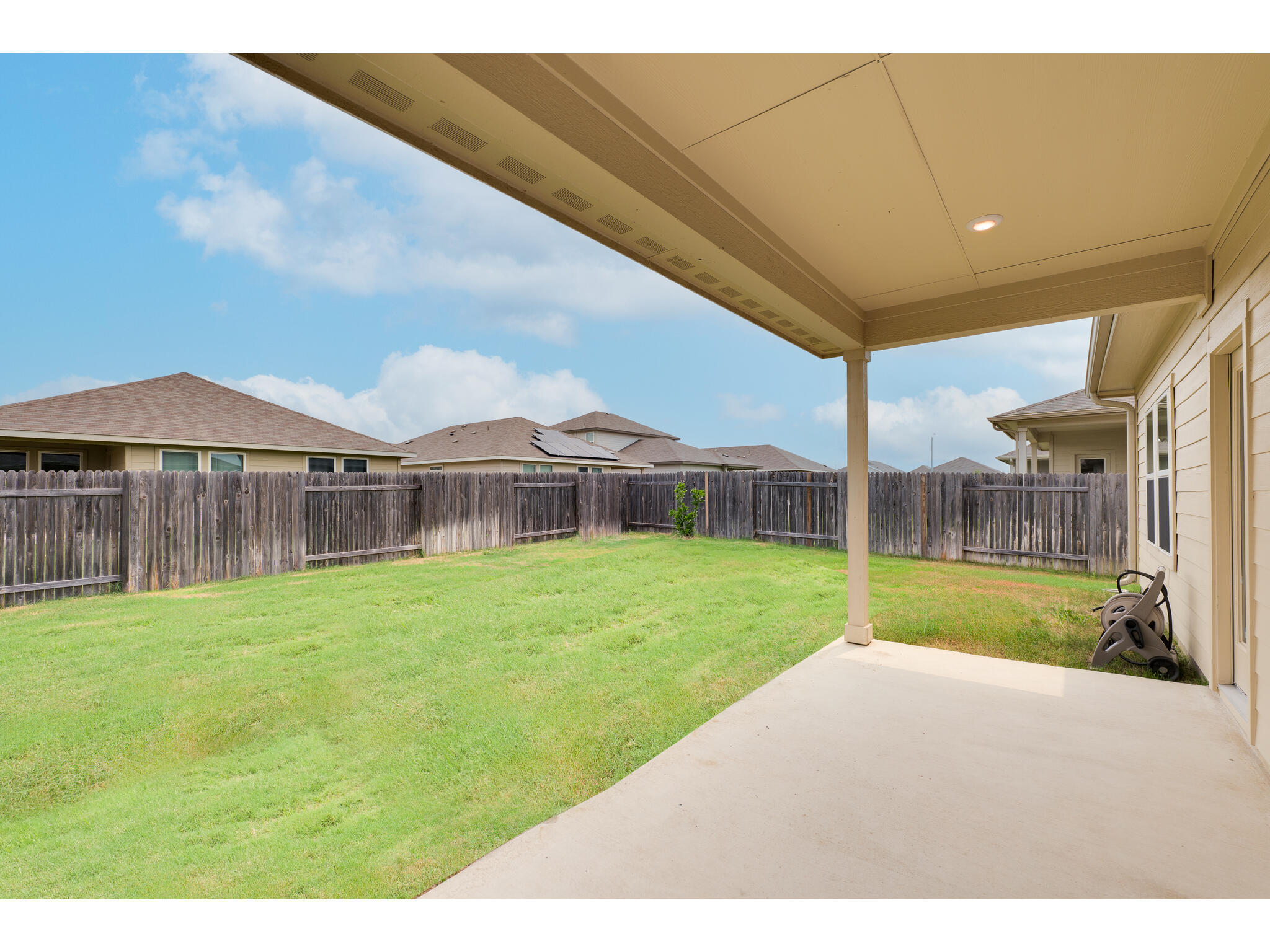 111 Grapefruit Road Hutto, TX 78634 - Photo 35 of 39 View of yard featuring a patio