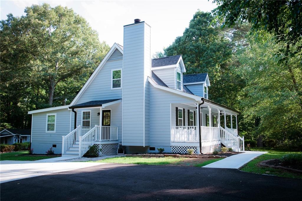 5582 Noblett Road Southwest Stone Mountain, GA 30087 - Photo 1 of 1 Gallery Image 1