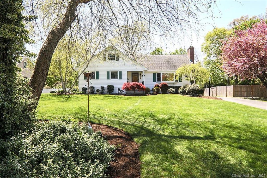 8 Woodcrest Road Norwalk, CT 06851 - Photo 1 of 1 It all starts with a manicured lawn and tastefull plantings.