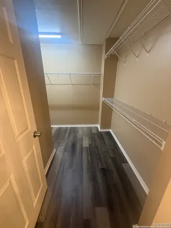 a view of wooden floor in a bathroom