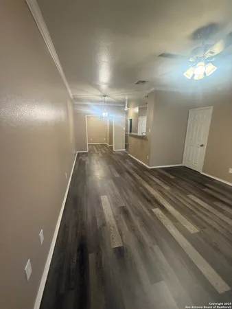 a view of a hallway with stairs