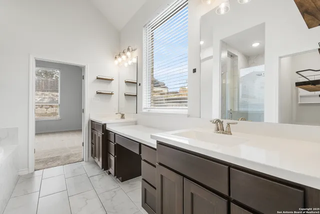 a kitchen with a sink and a stove