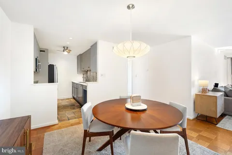 a view of a water fountain in front of a building