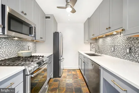 a view of a building with sitting area