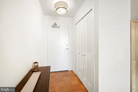 a swimming pool with outdoor seating and yard