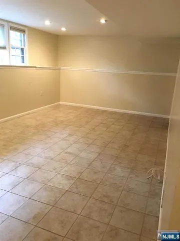 an empty room with a bathroom