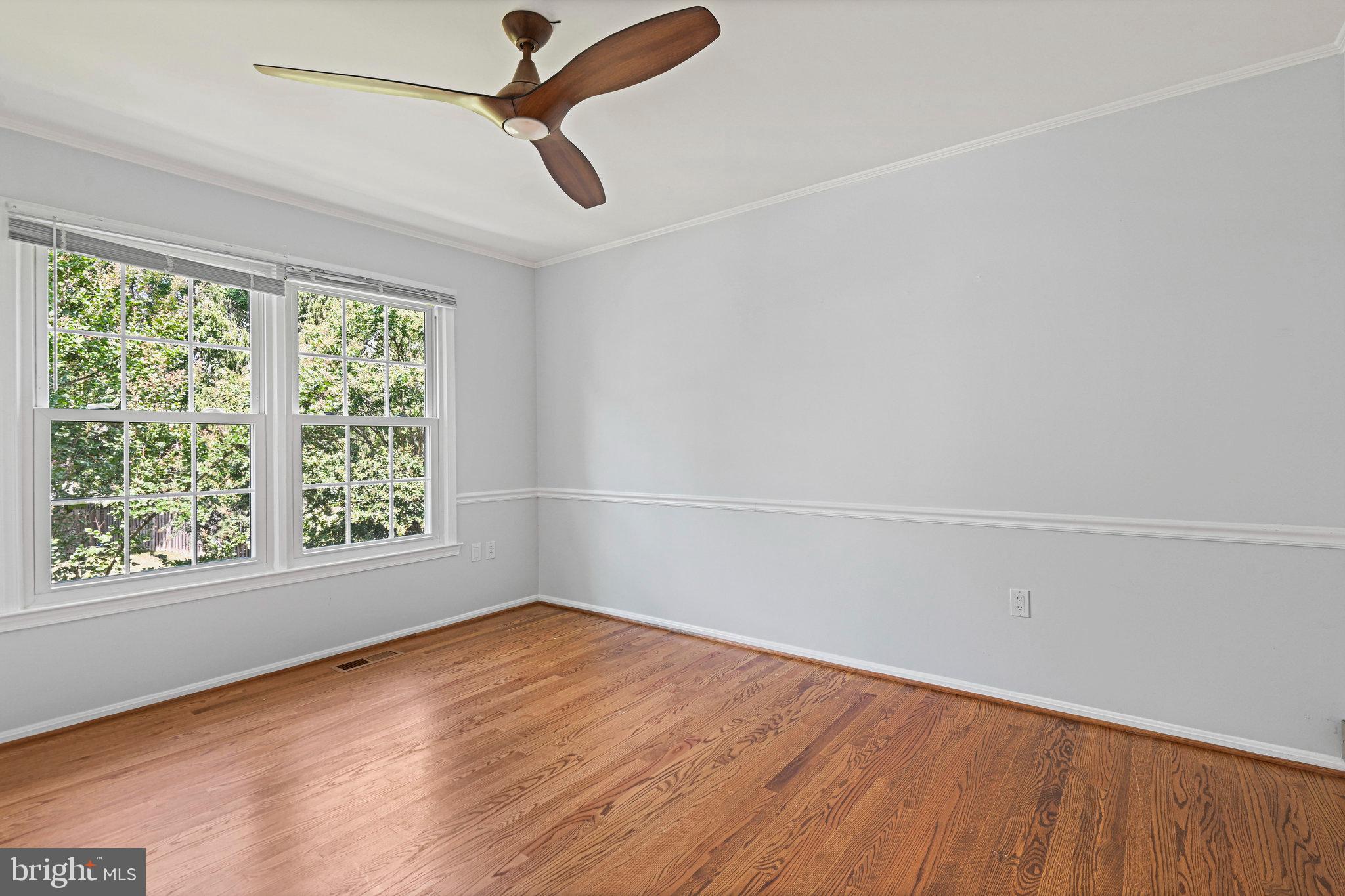 13345 Point Rider Lane Herndon, VA 20171 - Photo 29 of 43 wooden floor in an empty room with a window