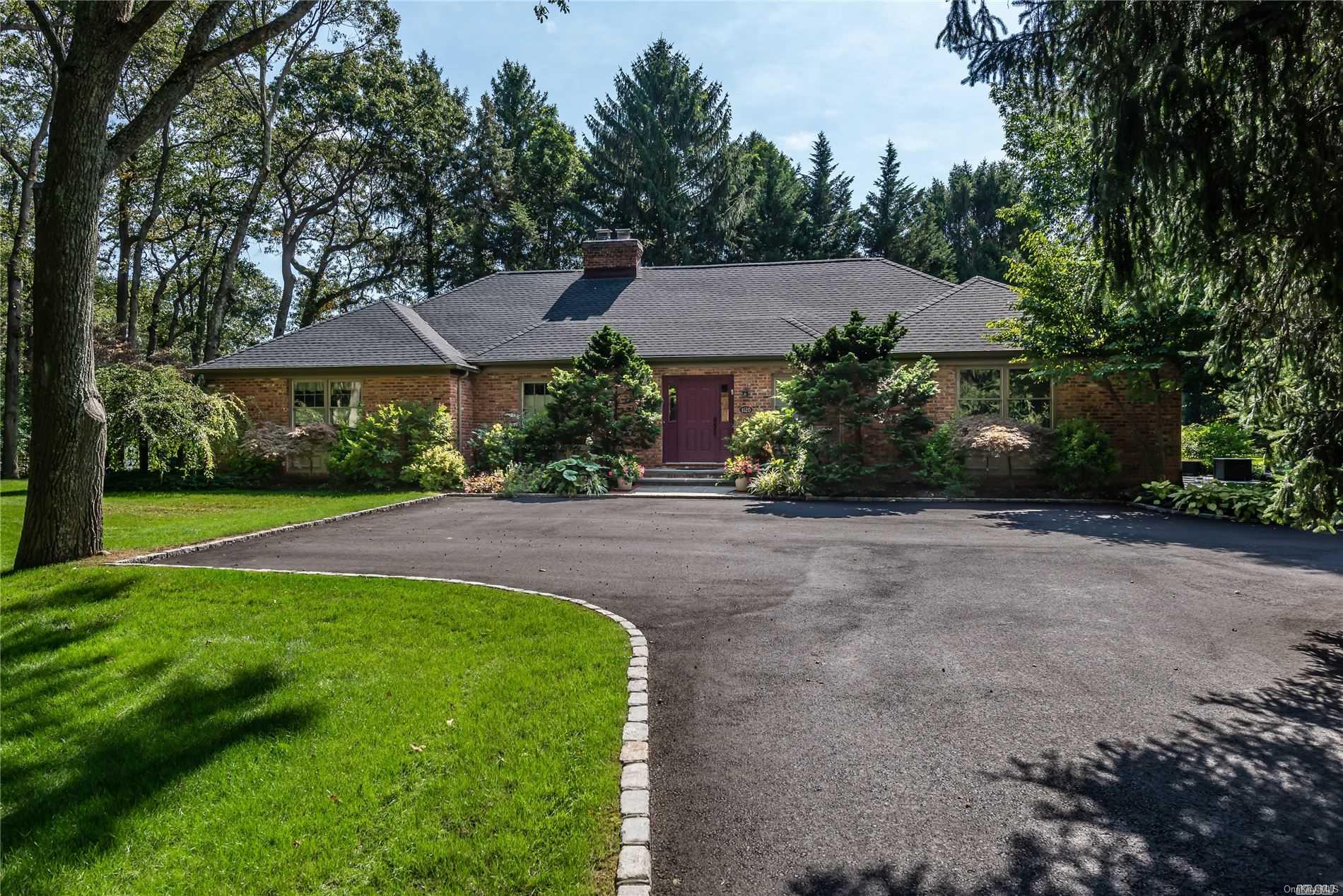 1120 Cove Edge Road Syosset, NY 11791 - Photo 1 of 1 a view of a house with a yard