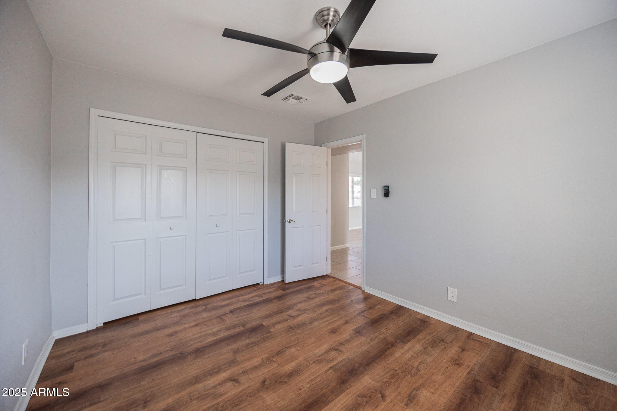 1619 East Whitton Avenue Phoenix, AZ 85016 - Photo 16 of 22 a view of empty room with wooden floor