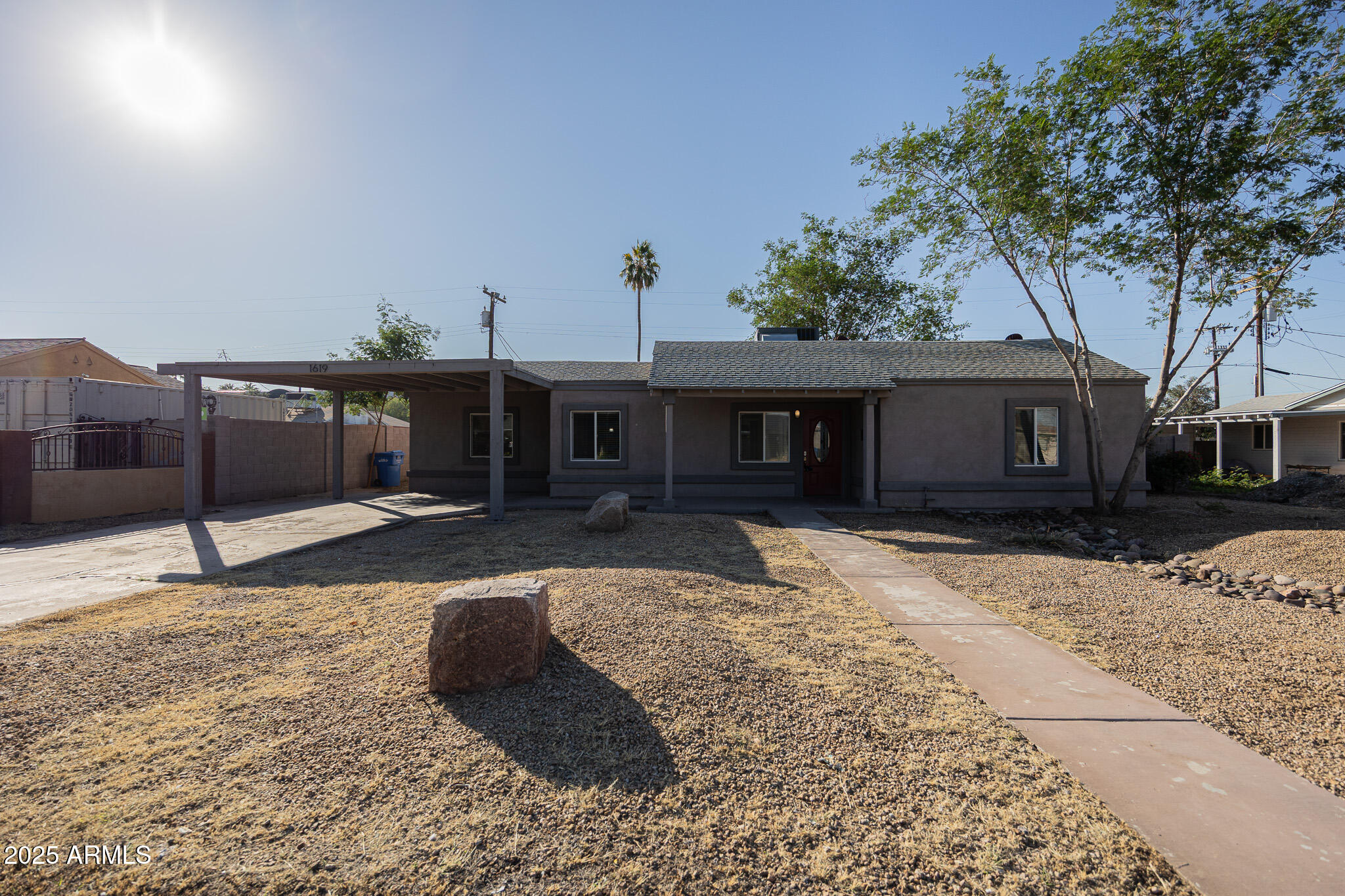 1619 East Whitton Avenue Phoenix, AZ 85016 - Photo 2 of 22 a front view of a house with a yard