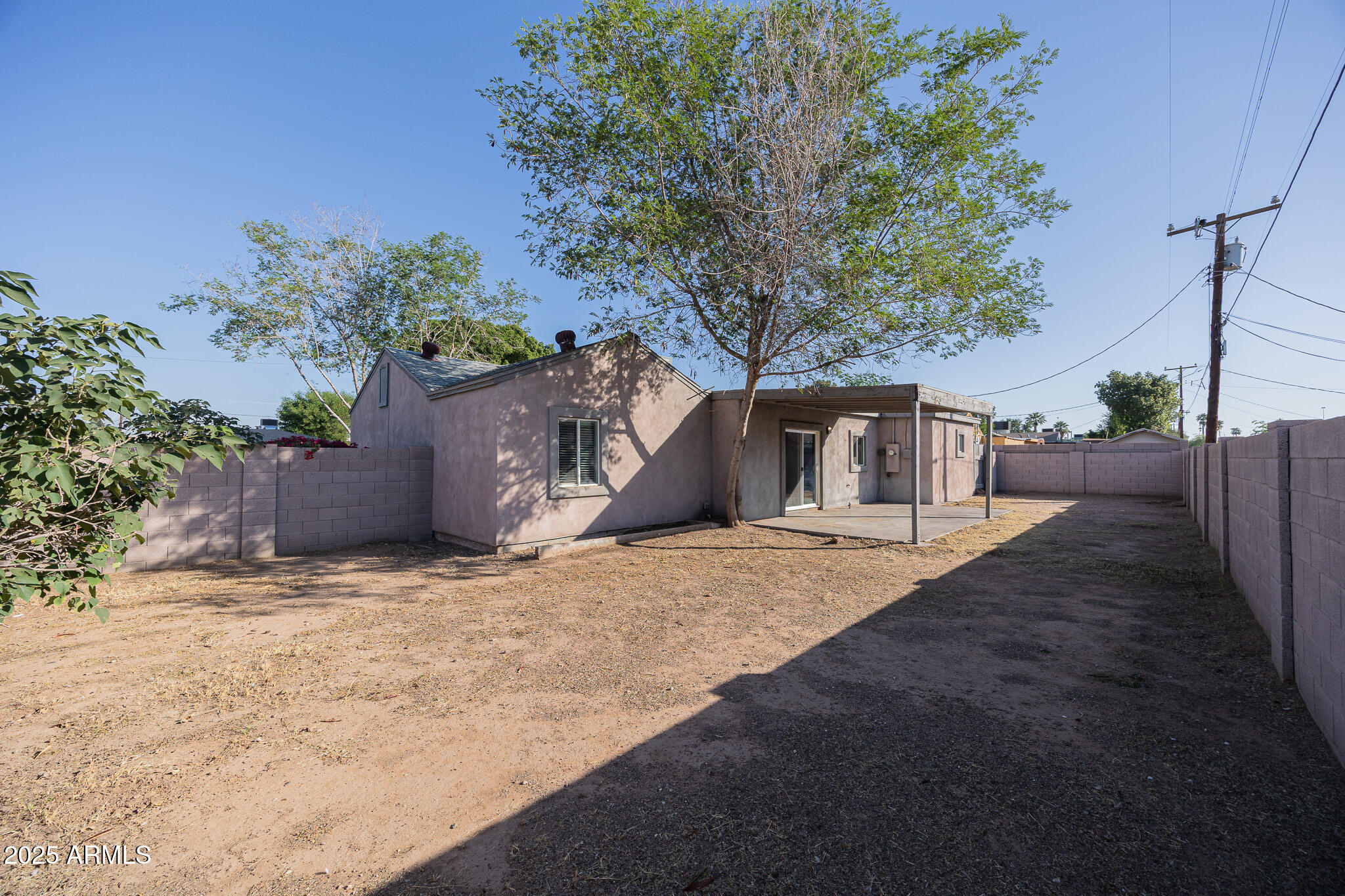 1619 East Whitton Avenue Phoenix, AZ 85016 - Photo 21 of 22 a front view of a house with a yard and garage