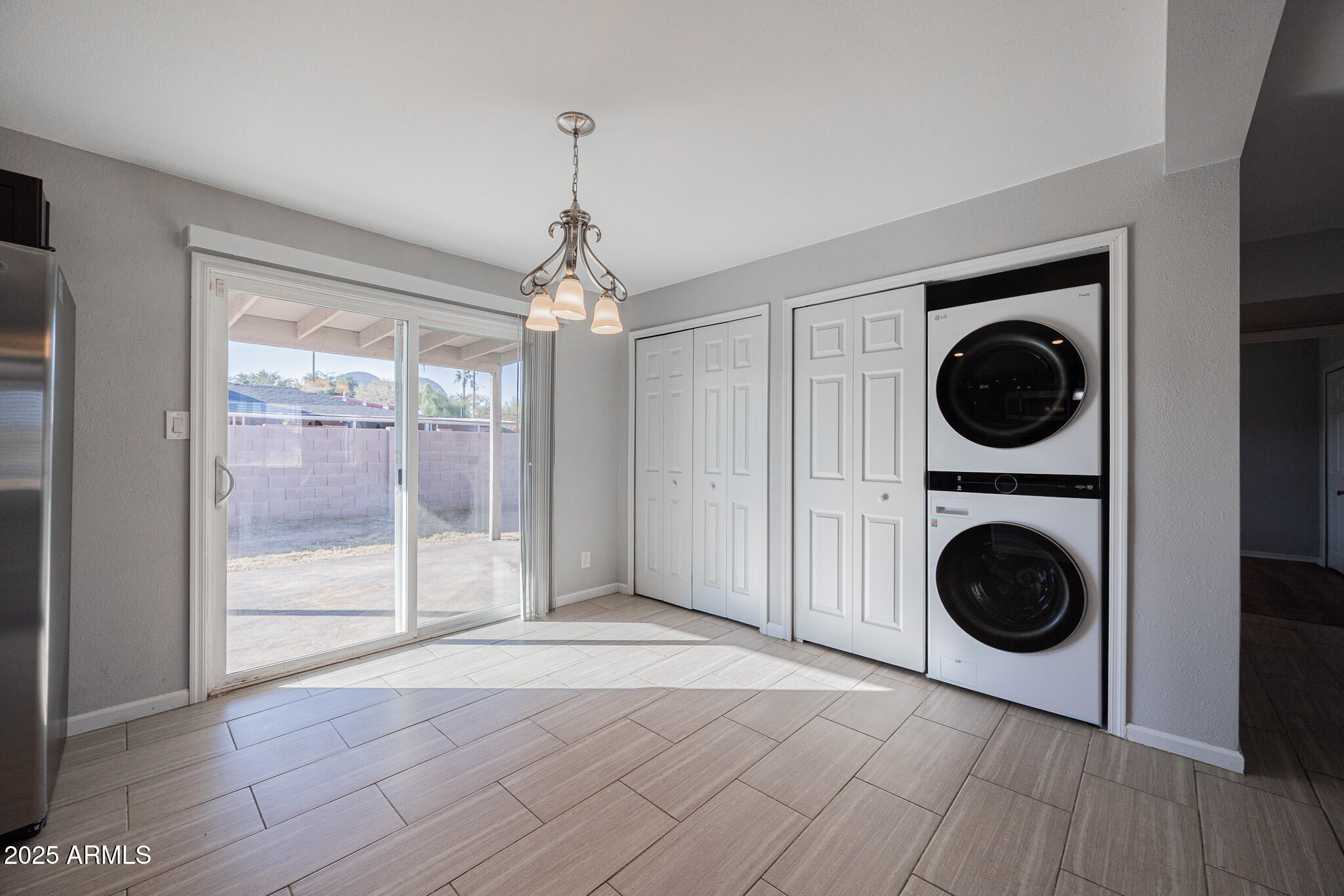 1619 East Whitton Avenue Phoenix, AZ 85016 - Photo 8 of 22 a view of a hallway with washer and dryer