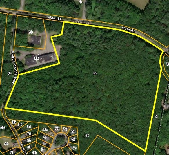 54 Main Street Bolton, MA 01740 - Photo 2 of 2 a view of a yard with a deck