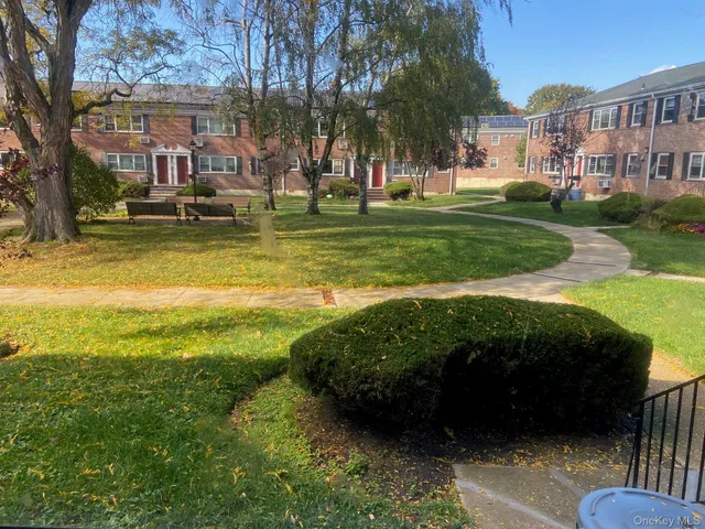 a view of a street with houses