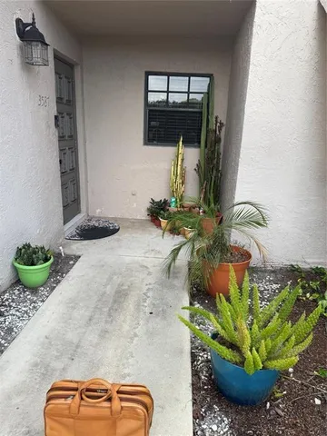 a vase of flowers sitting on a table