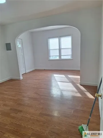 a view of an empty room and window