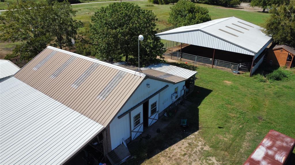16283 County Road 1004 Blue Ridge, TX 75424 - Photo 17 of 18 a view of a roof deck with wooden floor and fence