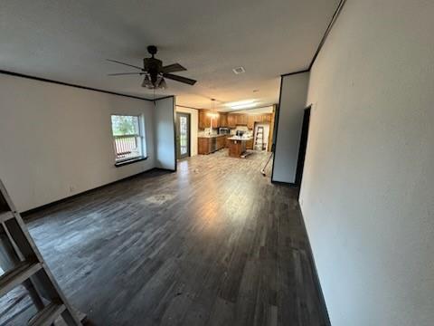 16283 County Road 1004 Blue Ridge, TX 75424 - Photo 8 of 18 wooden floor in an empty room with a window