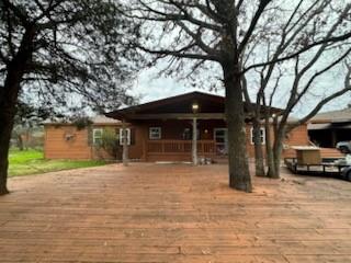 16283 County Road 1004 Blue Ridge, TX 75424 - Photo 8 of 19 a view of a house with a large tree