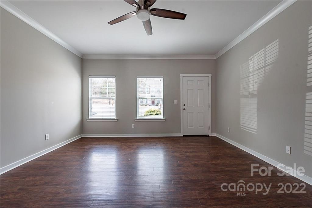 527 Alderman Lane Fort Mill, SC 29715 - Photo 3 of 17 an empty room with wooden floor and windows